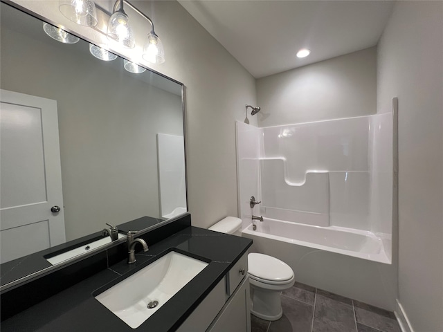 full bathroom with  shower combination, tile patterned floors, vanity, and toilet