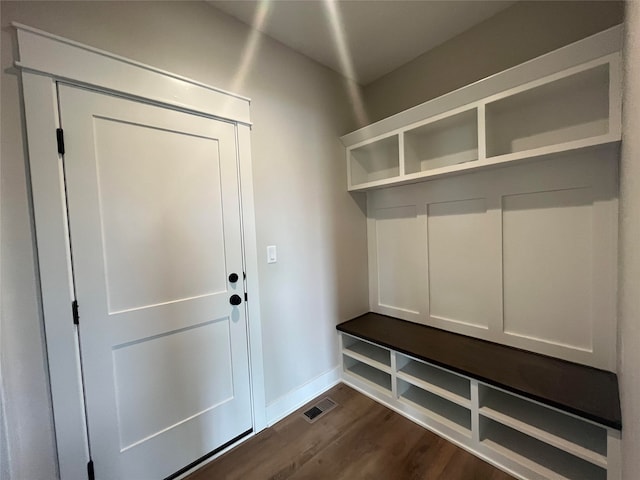 mudroom with dark hardwood / wood-style flooring