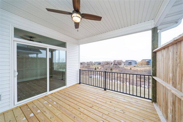 wooden deck with ceiling fan