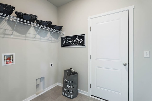 clothes washing area with washer hookup and hookup for an electric dryer