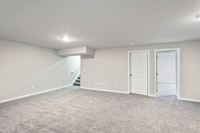 basement featuring carpet