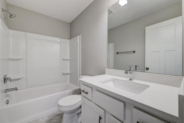 full bathroom featuring vanity, toilet, and shower / bath combination