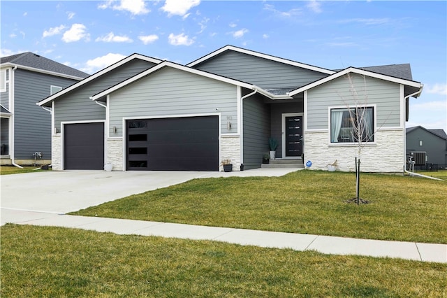 view of front of home with a front yard and central air condition unit