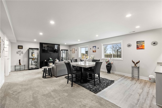 view of carpeted dining space