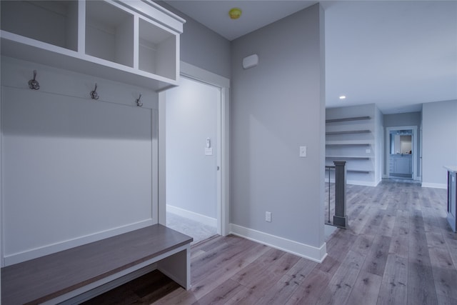 mudroom with light wood-type flooring