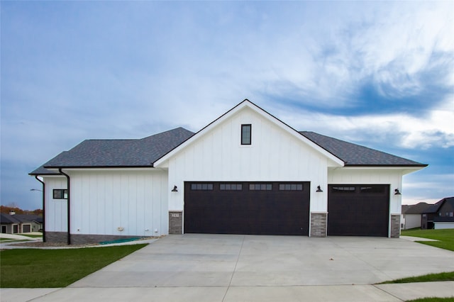 modern farmhouse with a garage