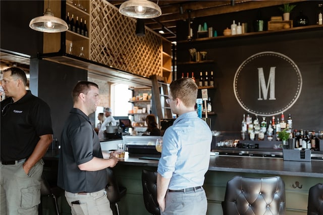 interior space featuring bar area