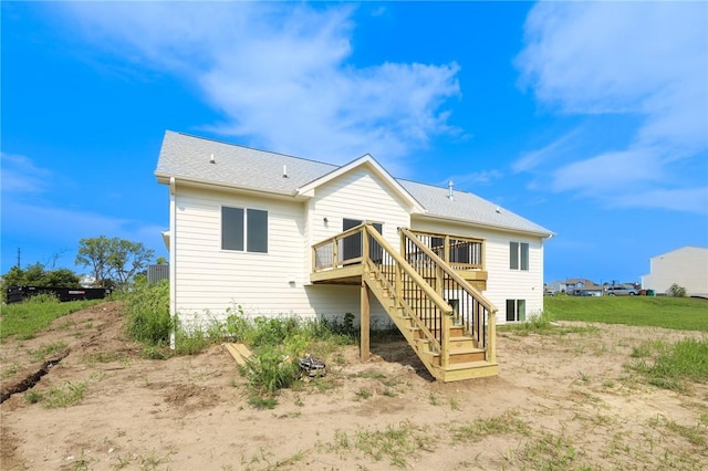 1772 Highland Cir SW, Altoona, IA 50009 - rear view of house with a wooden deck and stairway