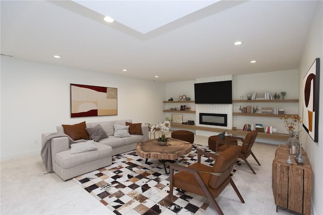 1772 Highland Cir SW, Altoona, IA 50009 - living room with recessed lighting, light carpet, a large fireplace, and baseboards