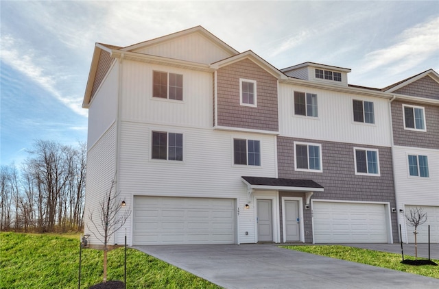 view of front of property with a garage