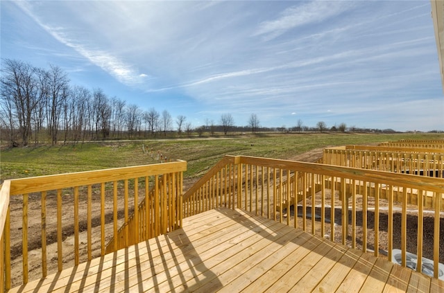 wooden terrace with a rural view