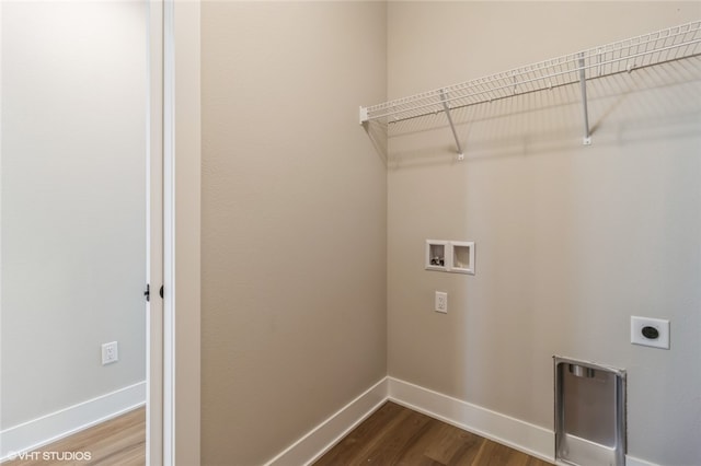 laundry room with hookup for an electric dryer, washer hookup, and hardwood / wood-style floors