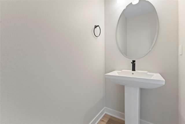 bathroom featuring hardwood / wood-style flooring