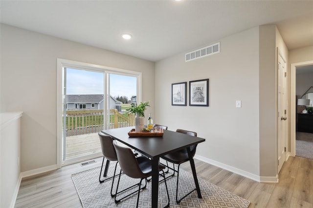 dining area featuring light hardwood / wood-style floors