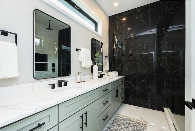 bathroom featuring vanity and walk in shower