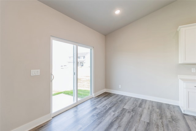 unfurnished dining area featuring light hardwood / wood-style floors