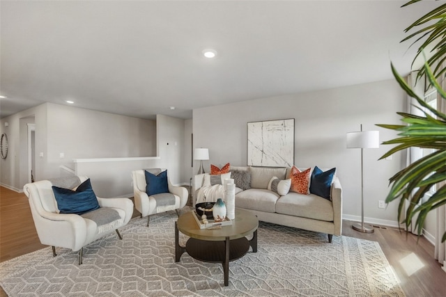 living room with light hardwood / wood-style flooring