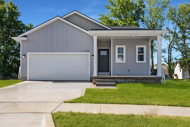 view of front facade with a front lawn and a garage