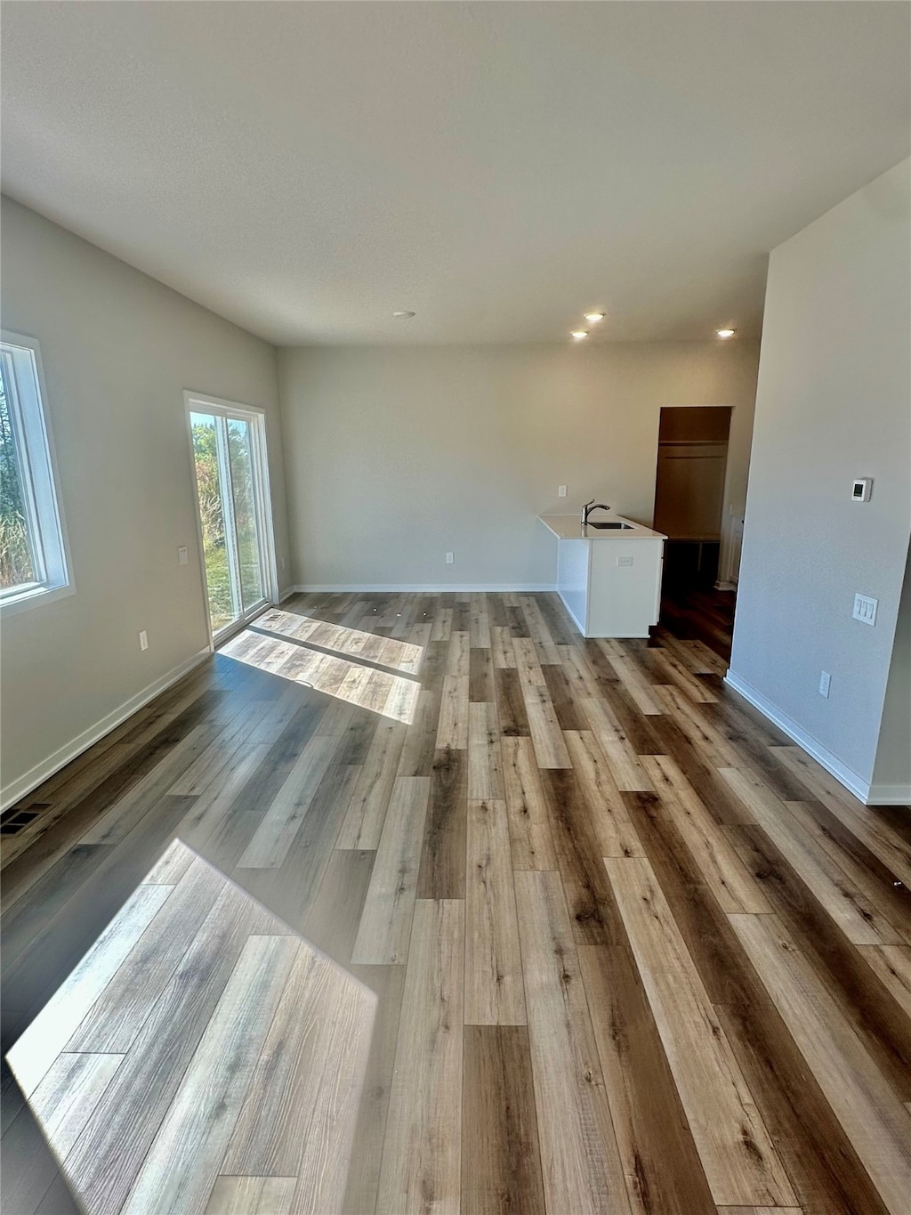 spare room featuring light wood-type flooring