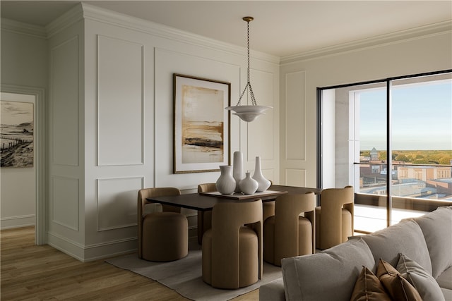 dining area featuring light hardwood / wood-style floors and ornamental molding