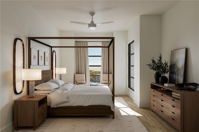 bedroom featuring ceiling fan and light hardwood / wood-style flooring