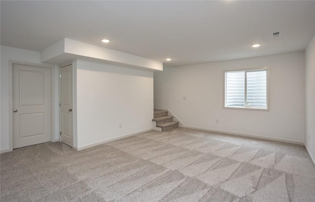 basement with light carpet