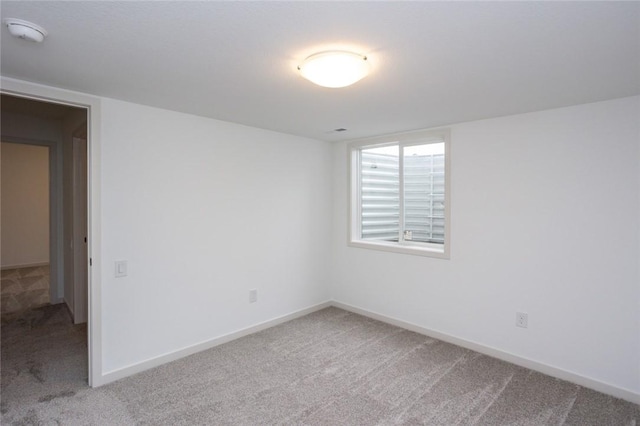 view of carpeted spare room