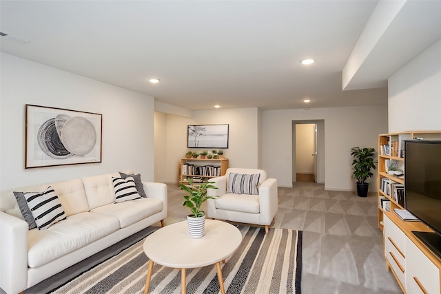 living room featuring light colored carpet