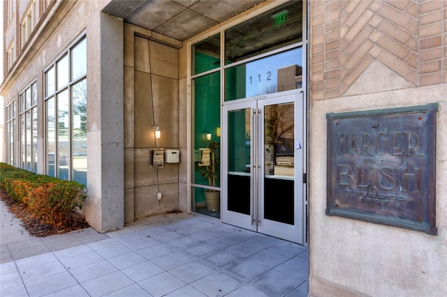 property entrance featuring french doors