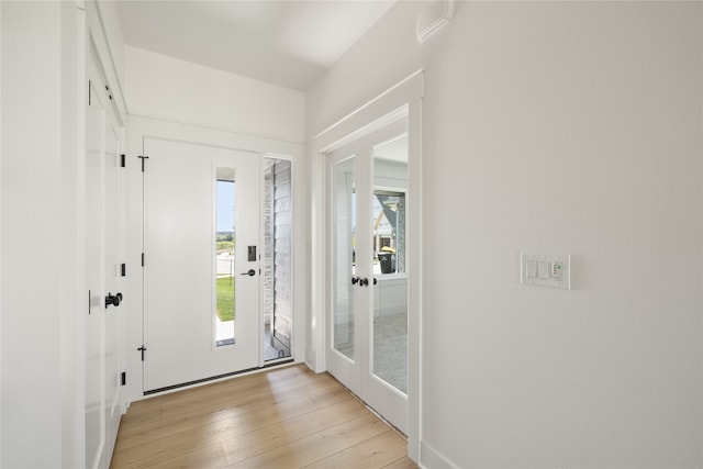 entrance foyer with light wood-type flooring