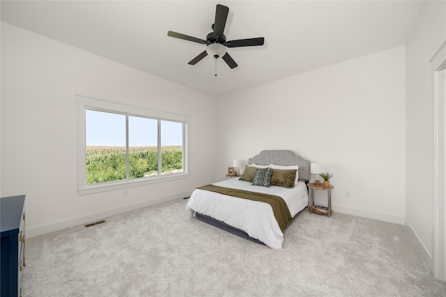 carpeted bedroom with ceiling fan