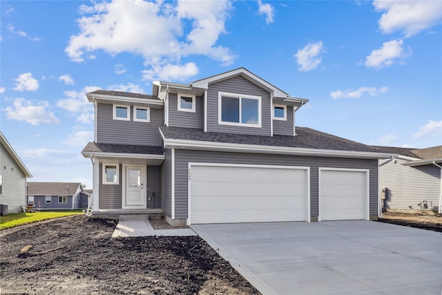 view of front of house with a garage