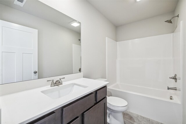 2009 White Oak Ln, Granger, IA 50109 - bathroom with vanity, toilet, and tub / shower combination