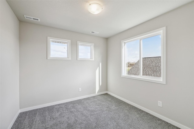 2009 White Oak Ln, Granger, IA 50109 - carpeted empty room featuring baseboards