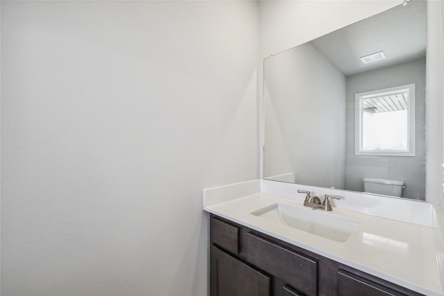 2009 White Oak Ln, Granger, IA 50109 - bathroom with vanity and toilet