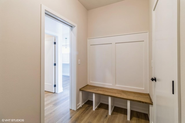 mudroom with wood finished floors