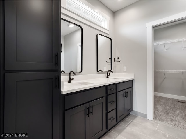 bathroom featuring vanity and tile patterned flooring