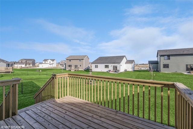 wooden terrace with a yard