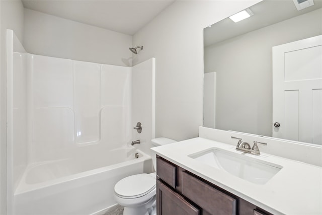 full bathroom featuring vanity, tub / shower combination, and toilet