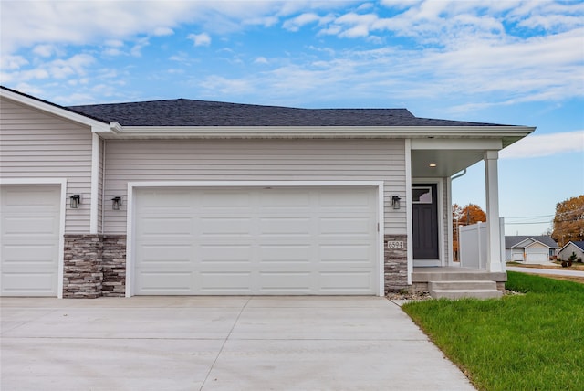 single story home with a garage