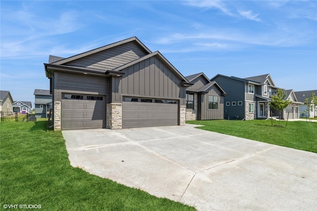 view of front of property with a front lawn and a garage