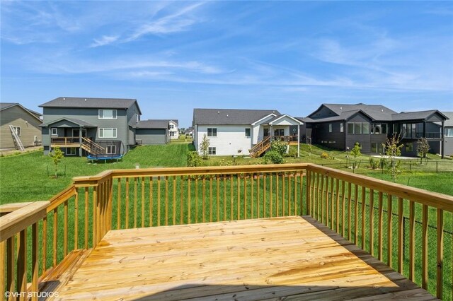 deck featuring a lawn