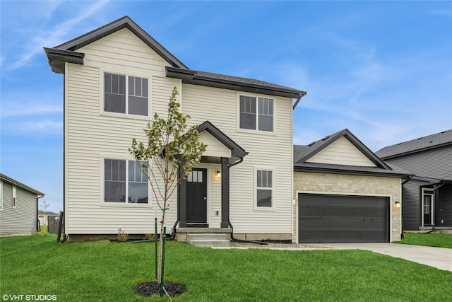 front of property with a front lawn and a garage