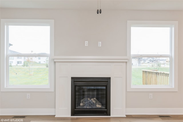 interior details with hardwood / wood-style flooring