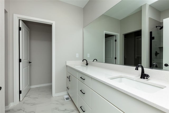 bathroom featuring walk in shower, dual bowl vanity, and tile floors