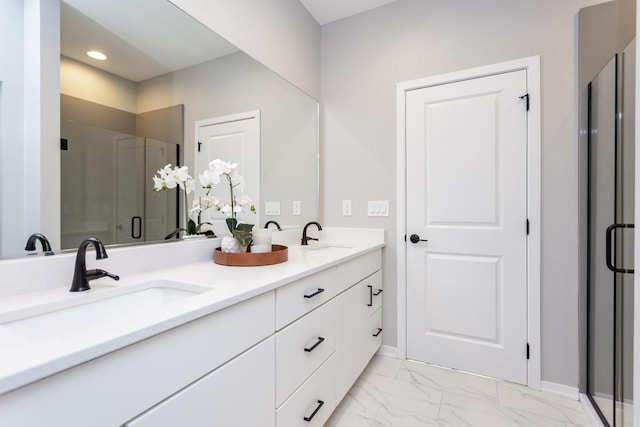 2738 Fleur Dr Unit 23, Des Moines, IA 50321 - full bathroom with a stall shower, marble look tile flooring, double vanity, and baseboards