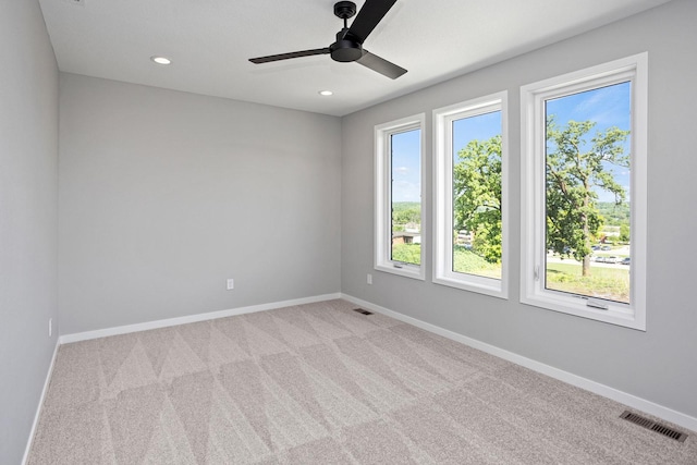 2738 Fleur Dr Unit 23, Des Moines, IA 50321 - carpeted spare room featuring baseboards, ceiling fan, and recessed lighting