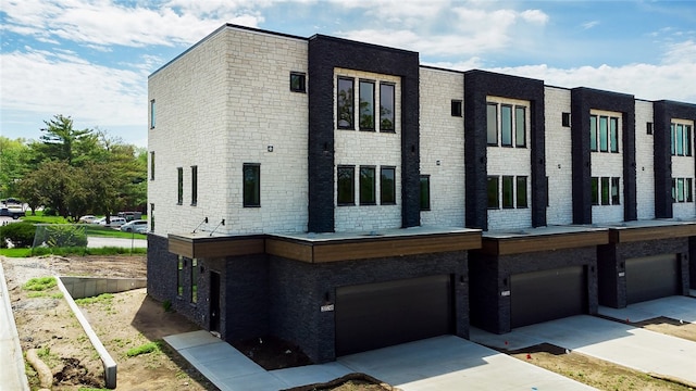 exterior space with a garage