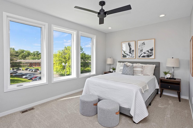 2714 Fleur Dr Unit 11, Des Moines, IA 50321 - bedroom featuring carpet flooring, baseboards, ceiling fan, and recessed lighting