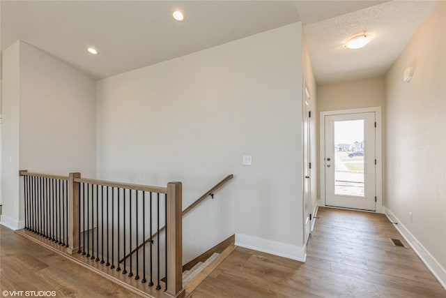 entrance foyer featuring light hardwood / wood-style floors